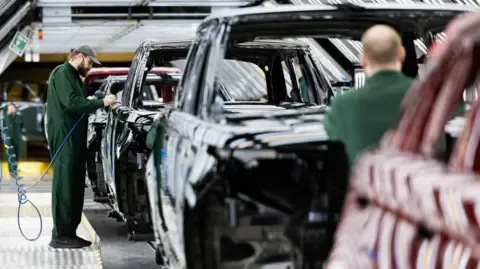 Jaguar Land Rover Supply Chain Staff Reportedly Told to Apply for Government Benefits, Labor Group States