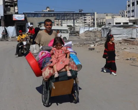Escaping away from Destruction to Destruction: Gaza City Residents Grapple with Heart-Wrenching Decision